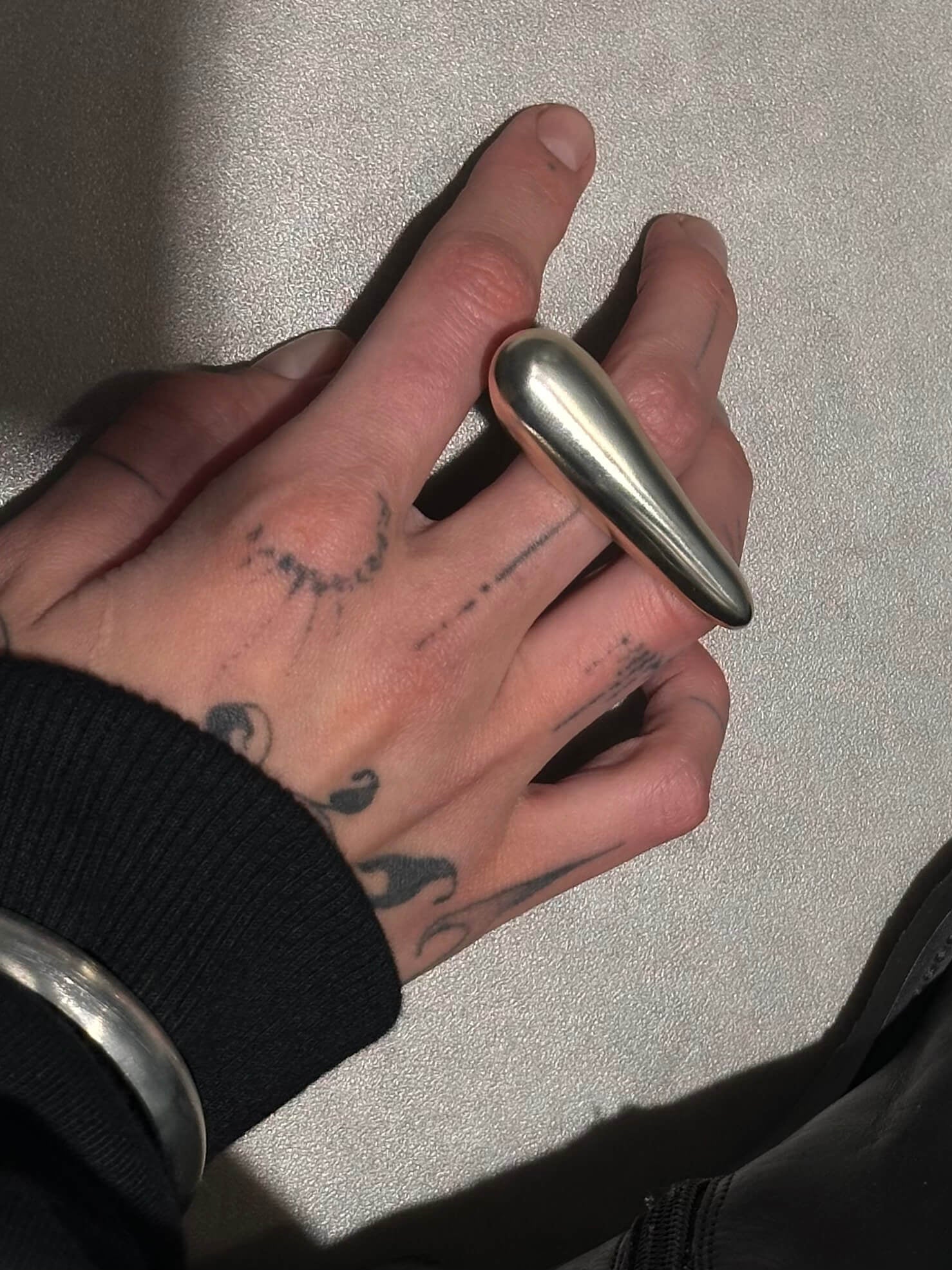 ARCHE recycled 925 silver ring worn on hand - chunky  sculptural form, matte finish, made to order