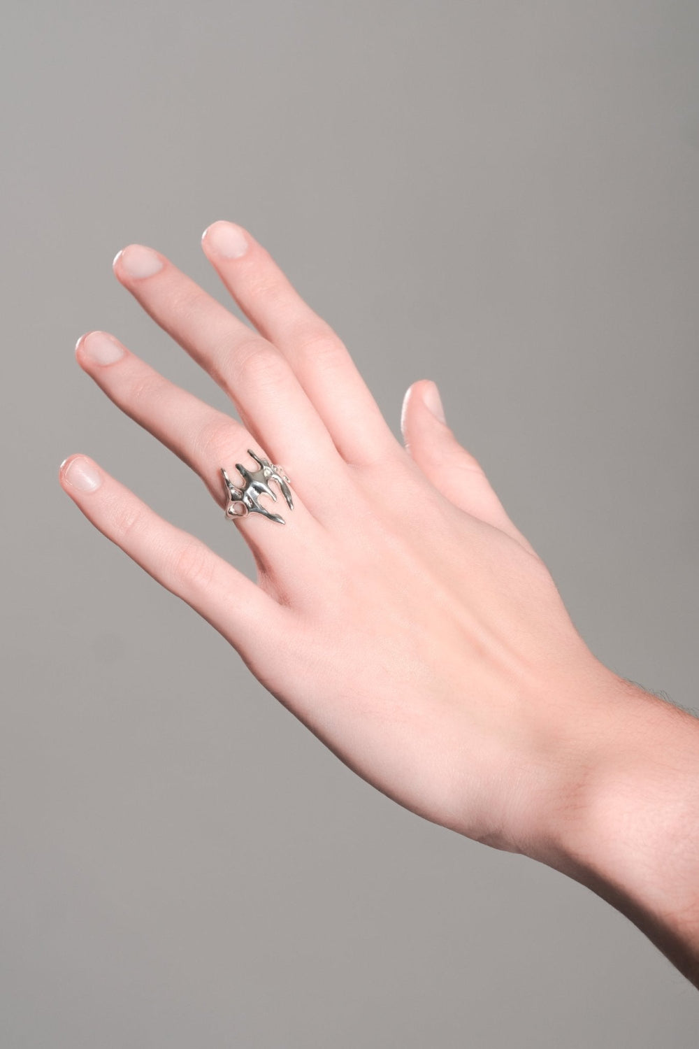 BQ-8 sterling silver statement ring by BROQ worn on hand - dramatic organic top, slim base, made to order